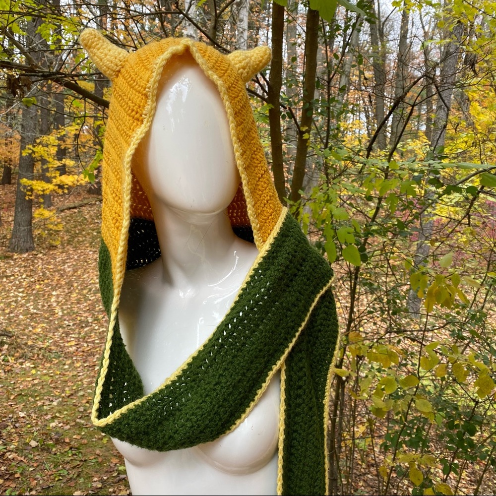Funky hand crafted scarf and hat with little horns. 😊